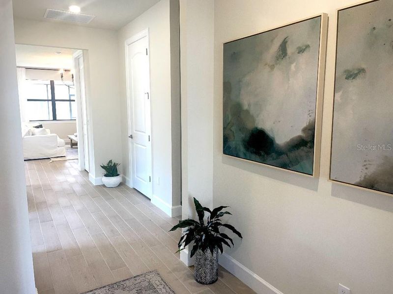 Furnished interior view inside a new home in Preserve at Waterway Village, Vero Beach (Image 8).