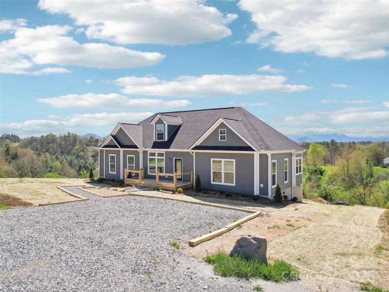 Front exterior of a new home in , Weaverville, NC, highlighting curb appeal (Image 15).