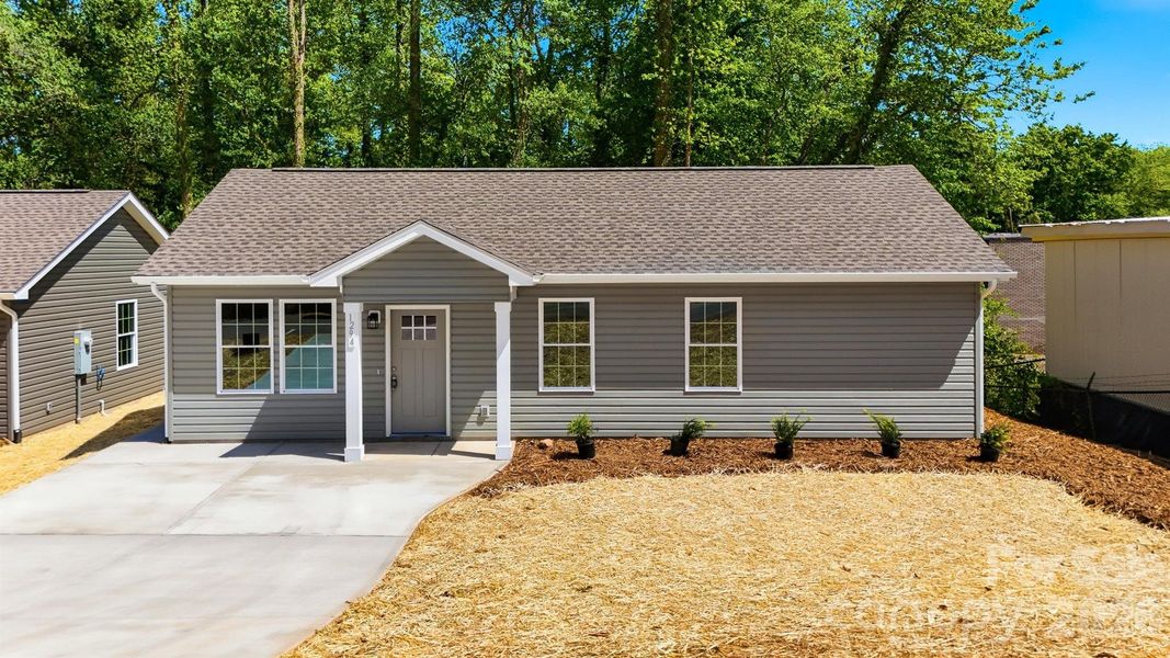 Front exterior of a new home in , Hickory, NC, highlighting curb appeal (Image 20).