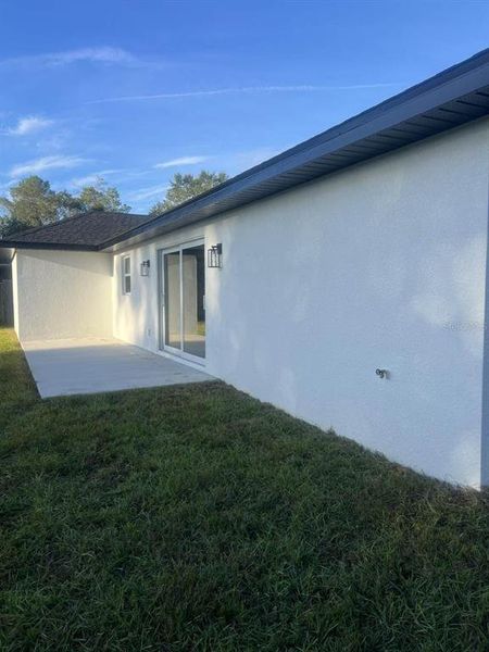 Exterior details and patio area of a home in , Spring Hill (Image 26). Exterior details and patio area of a home in , Spring Hill (Image 26).
