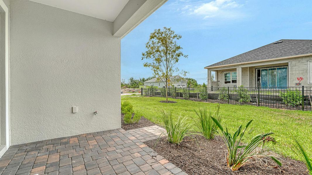 Exterior details and patio area of a home in Wildleaf Real Estate and Homes for Sale in Parrish, FL - Neal Communities, Parrish (Image 20).