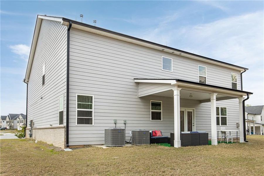 Exterior details and patio area of a home in Independence, Loganville (Image 4).
