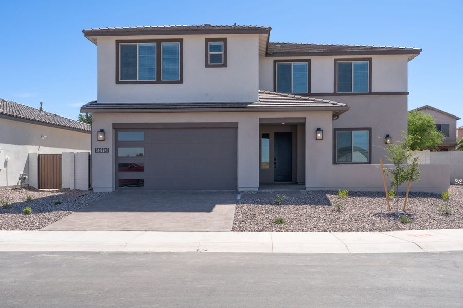 Front exterior of a new home in Terraza, San Tan Valley, AZ, highlighting curb appeal (Image 1). Front exterior of a new home in Terraza, San Tan Valley, AZ, highlighting curb appeal (Image 1).