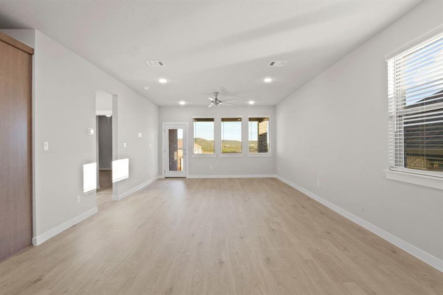 Living Room in the Willow home plan by Trophy Signature Homes – REPRESENTATIVE PHOTO Living Room in the Willow home plan by Trophy Signature Homes – REPRESENTATIVE PHOTO