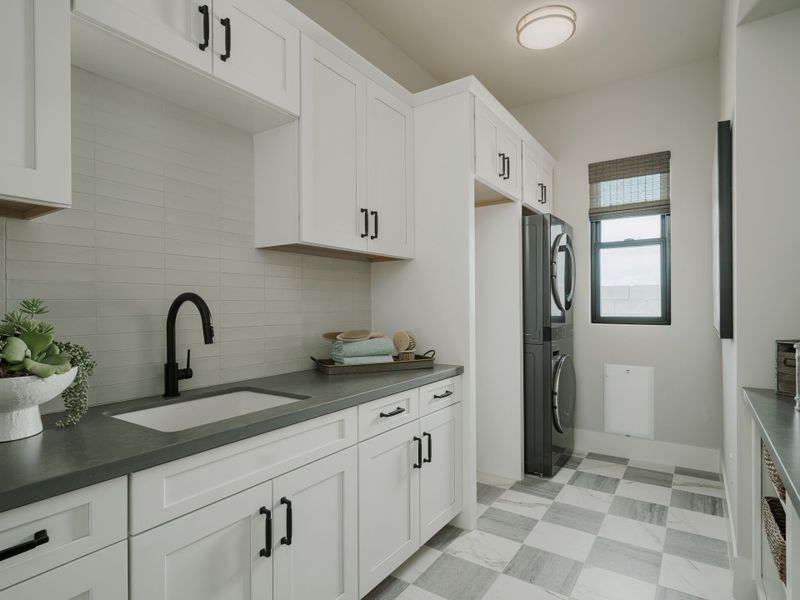 Representative furnished interior of a home built from the Plan 6002 by Camelot Homes in Stone Crest, Gilbert (Image 19).