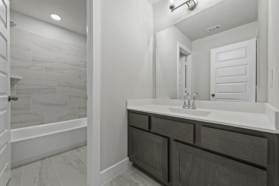 Furnished interior view inside a new home in The Trails, New Caney (Image 14).
