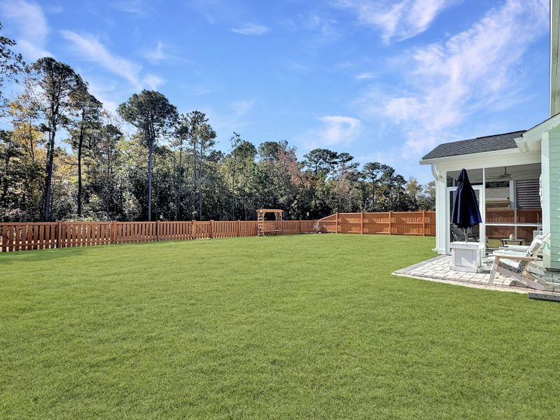 Exterior details and patio area of a home in Hewing Farms, Summerville (Image 3). Exterior details and patio area of a home in Hewing Farms, Summerville (Image 3).