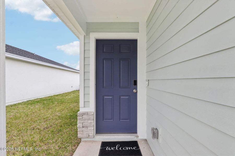 Exterior details and patio area of a home in Flagler Village - Classic Series, Palm Coast (Image 20).