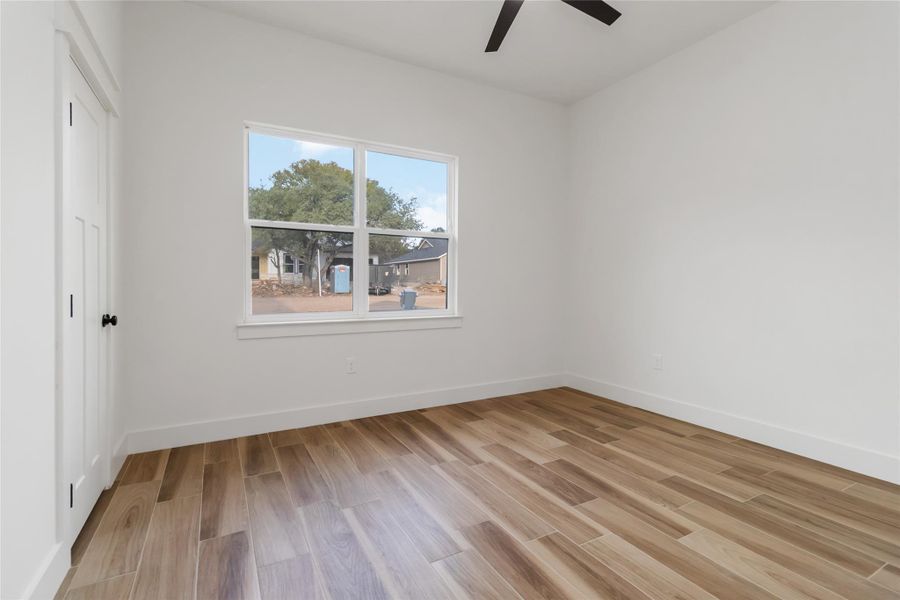 Secondary bedroom facing front of home Secondary bedroom facing front of home