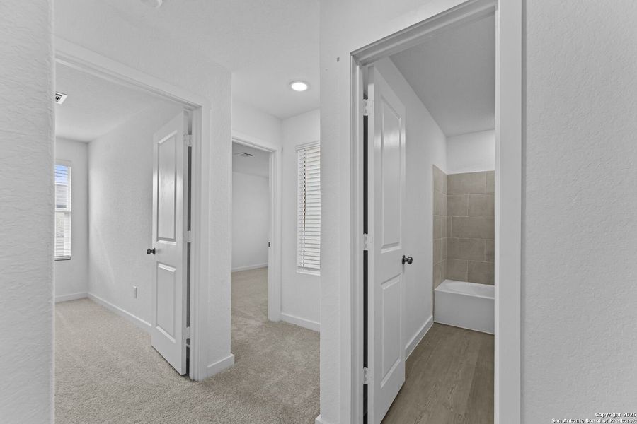 Spacious, unfurnished interior of a new home in Voss Farms: Coastline Collection, New Braunfels (Image 17).