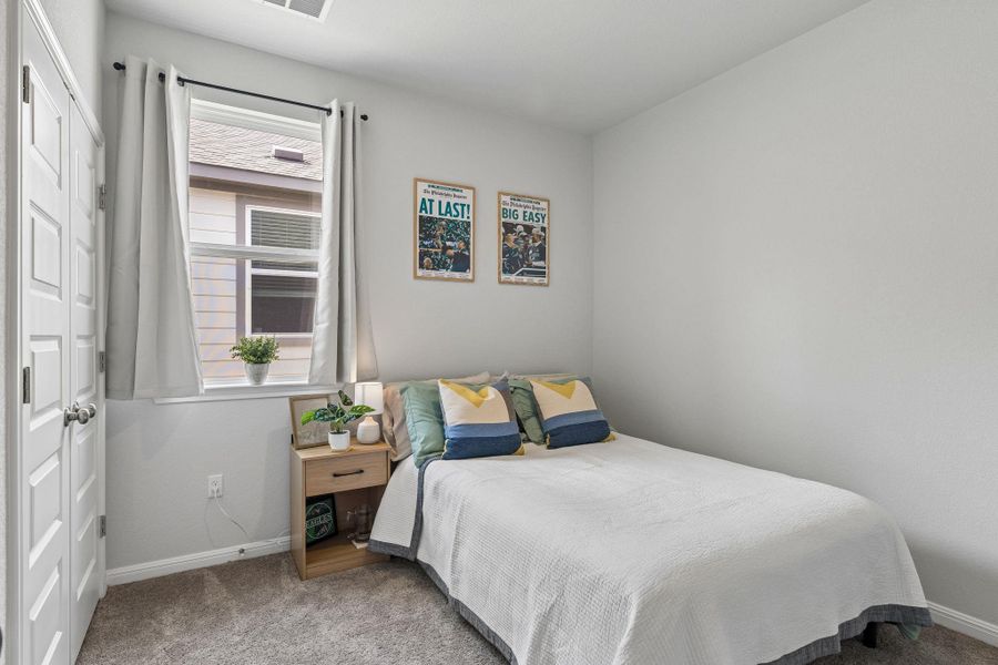 Furnished interior view inside a new home in Stallion Run, Buda (Image 16).