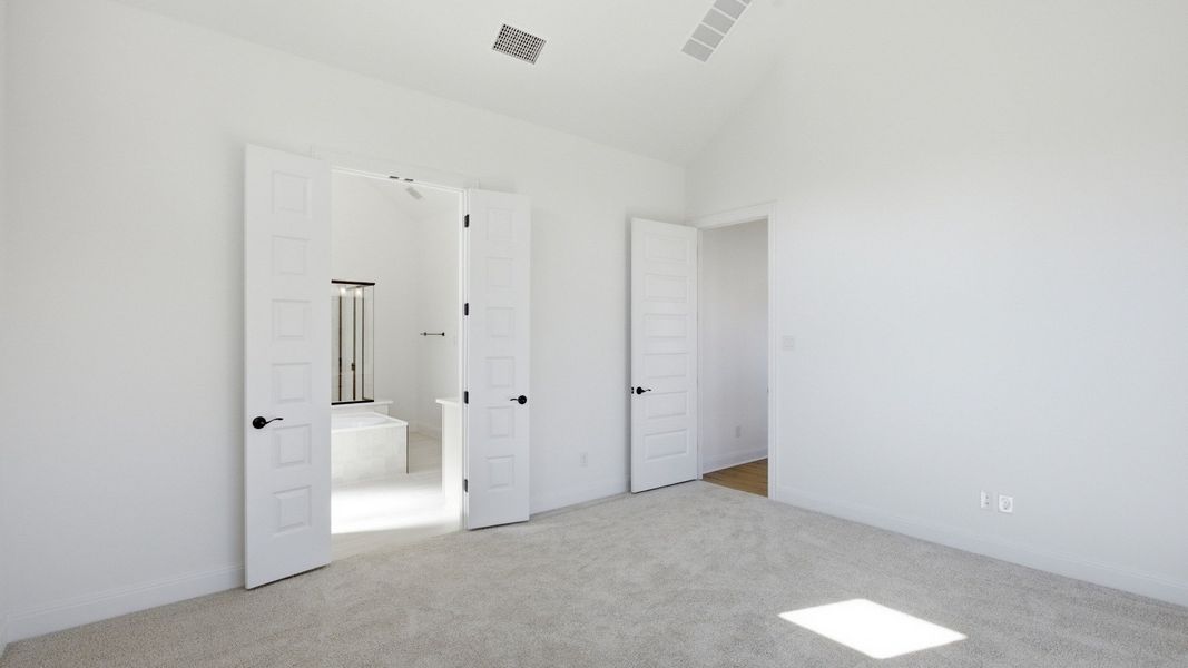 Furnished interior view inside a new home in Oaks at San Gabriel, Georgetown (Image 18).