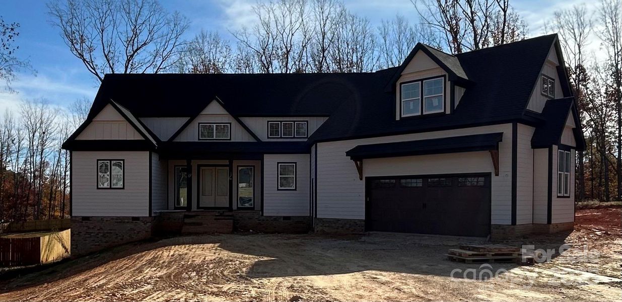 Front exterior of a new home in , Lincolnton, NC, highlighting curb appeal (Image 5).