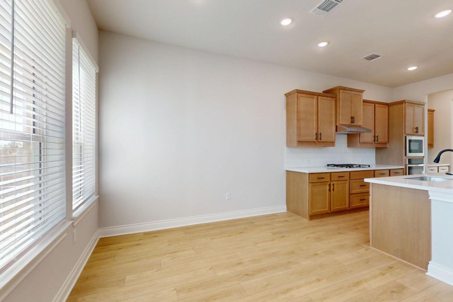 Furnished interior view inside a new home in Edgewood, Leander (Image 11). Furnished interior view inside a new home in Edgewood, Leander (Image 11).