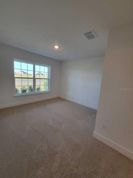 Spacious, unfurnished interior of a new home in Ocala Crossings South, Ocala (Image 18).