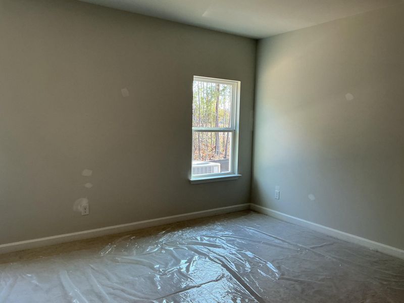 In-progress construction of a new home in Tea Farm: Presidents Series, Ravenel, SC (Image 13).