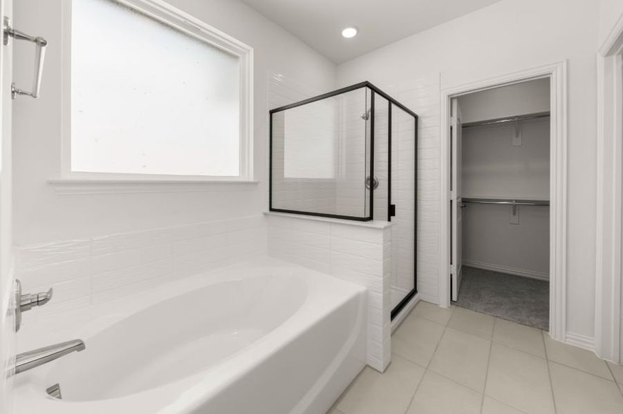 Representative furnished interior of a home built from the Cypress by UnionMain Homes in Edgewater, Fate (Image 16).