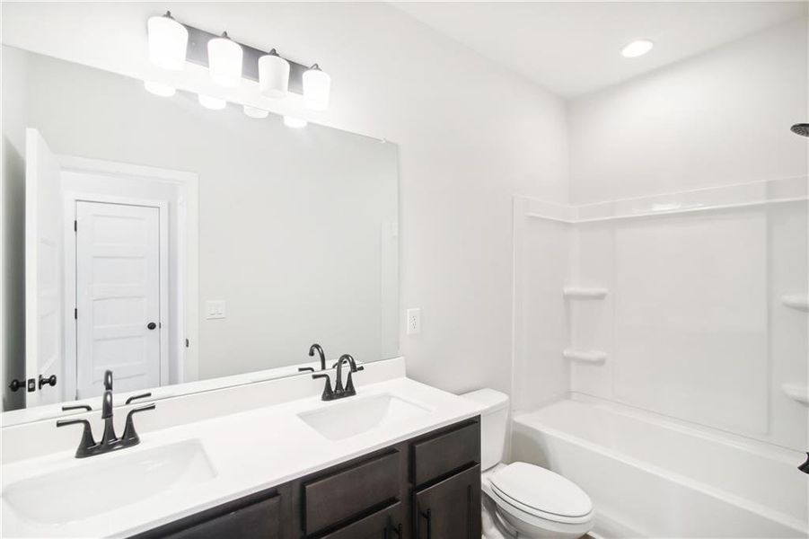Furnished interior view inside a new home in Rosewood Lake Estates, Hoschton (Image 8).