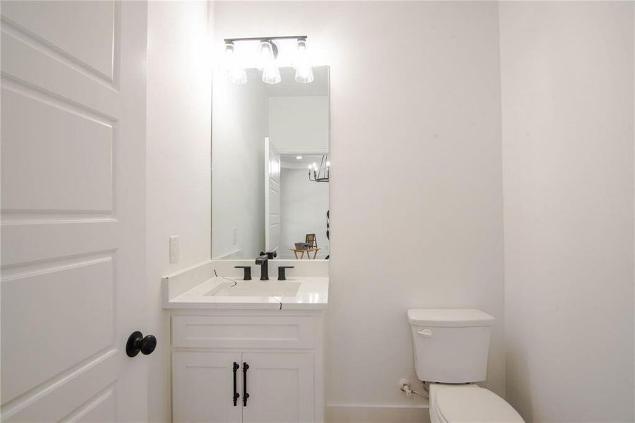 Bathroom with vanity and toilet