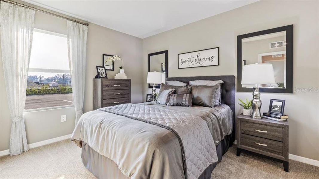 Furnished interior view inside a new home in Coral Lakes - Tradition & Express, Punta Gorda (Image 18). Furnished interior view inside a new home in Coral Lakes - Tradition & Express, Punta Gorda (Image 18).