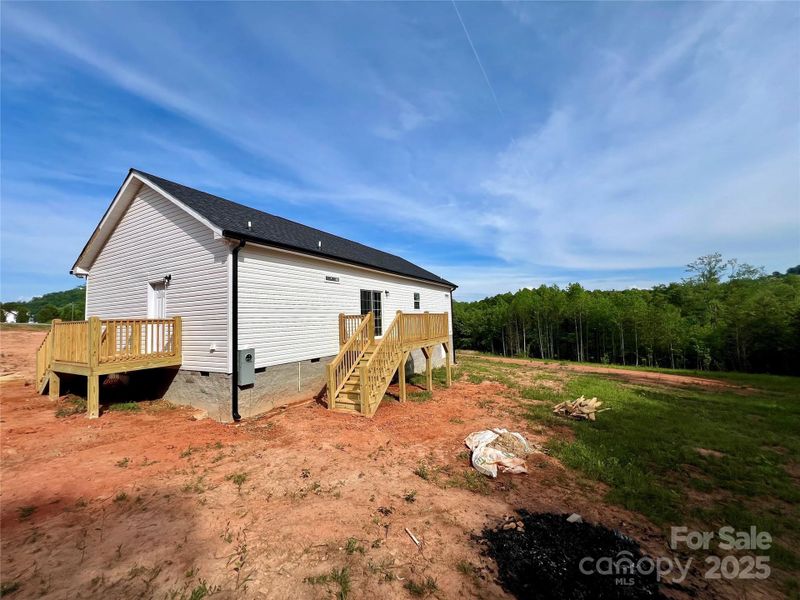Front exterior of a new home in , Taylorsville, NC, highlighting curb appeal (Image 1).