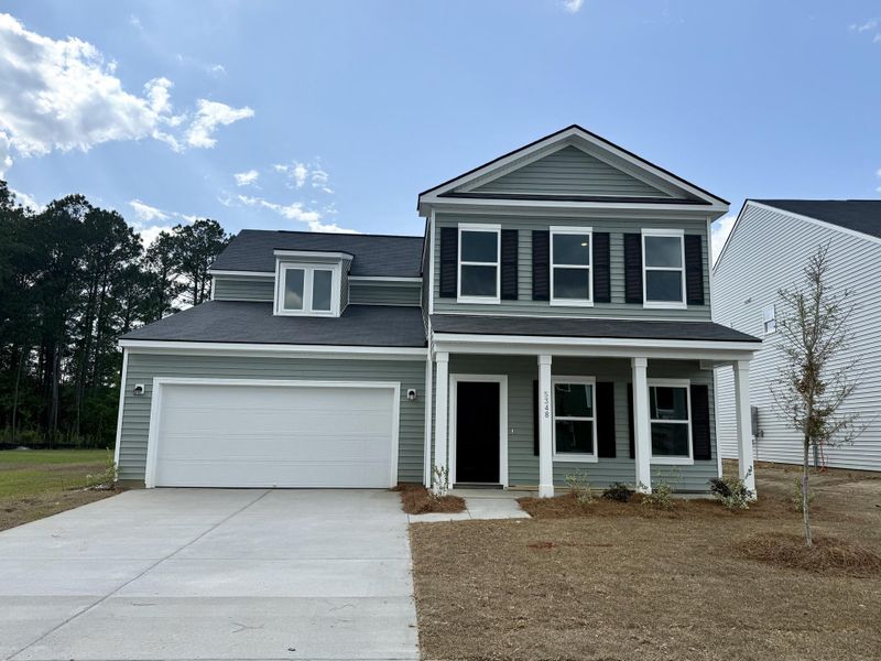 Front exterior of a new home in , Summerville, SC, highlighting curb appeal (Image 22).