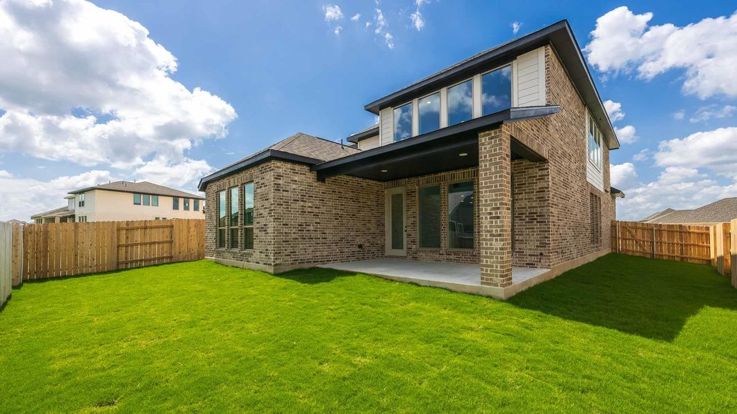 Exterior details and patio area of a home in Lariat 45', Liberty Hill (Image 3). Exterior details and patio area of a home in Lariat 45', Liberty Hill (Image 3).