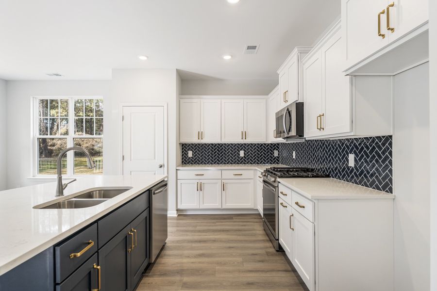 Furnished interior view inside a new home in Landing at Pine Lake, Anderson (Image 9).