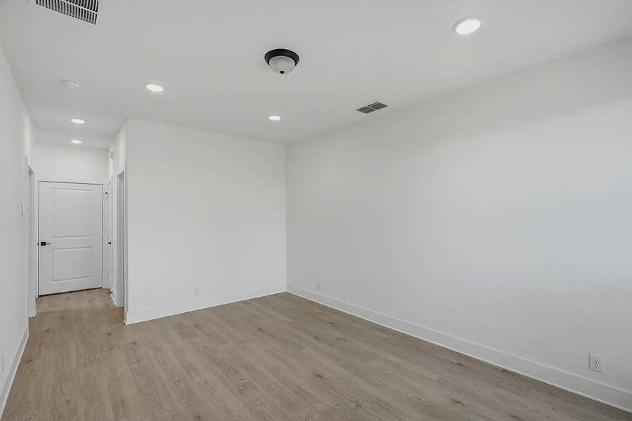 Representative unfurnished interior of a home built from the Athena by Chesmar Homes in Prominence Urban, San Antonio (Image 34).