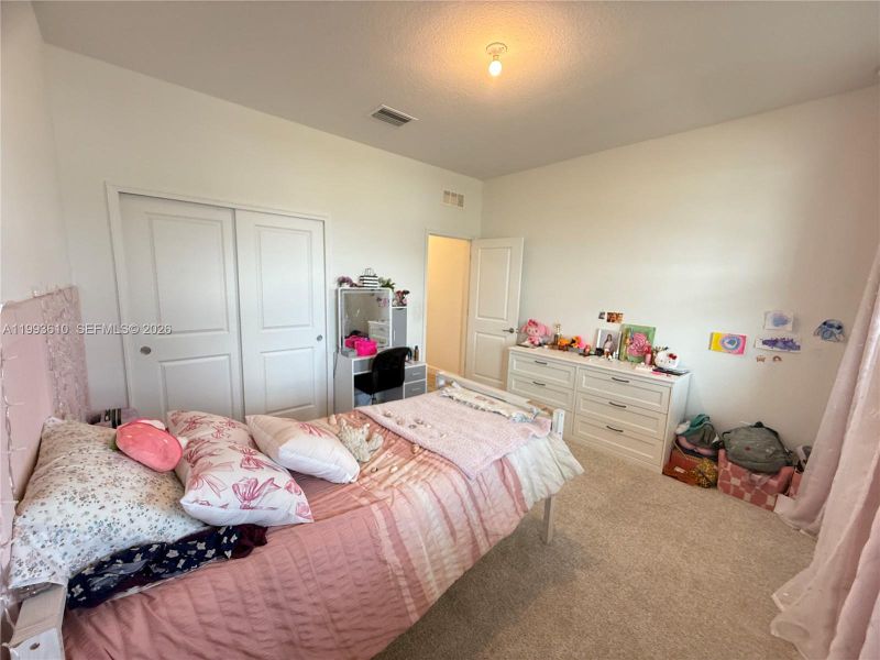 Furnished interior view inside a new home in Tradition, Port St. Lucie (Image 13).
