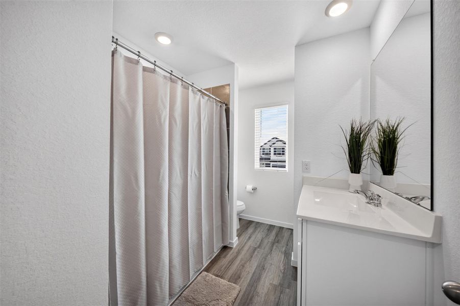Furnished interior view inside a new home in The Villas at Legacy Park, Houston (Image 13).