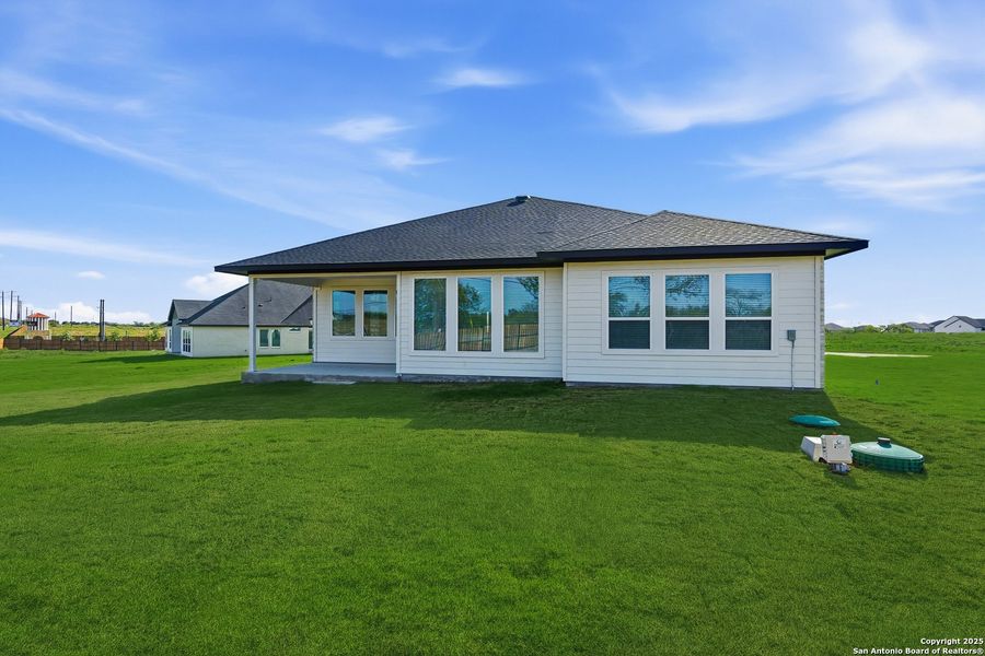 Exterior details and patio area of a home in Sienna Lakes, San Antonio (Image 3).