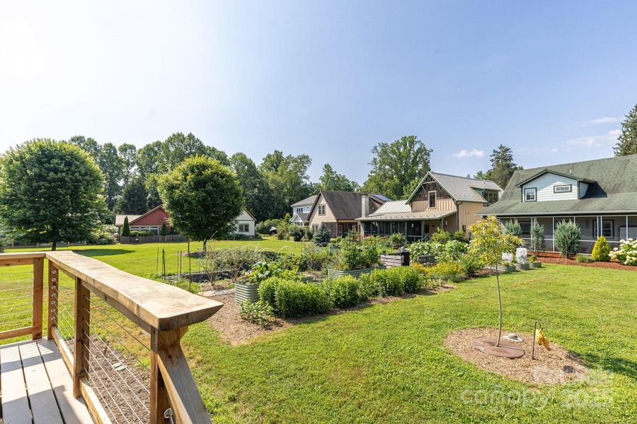 Just outside your door -  a comprehensive edible landscape, including: common gardens, orchards, vineyards and berry patches.