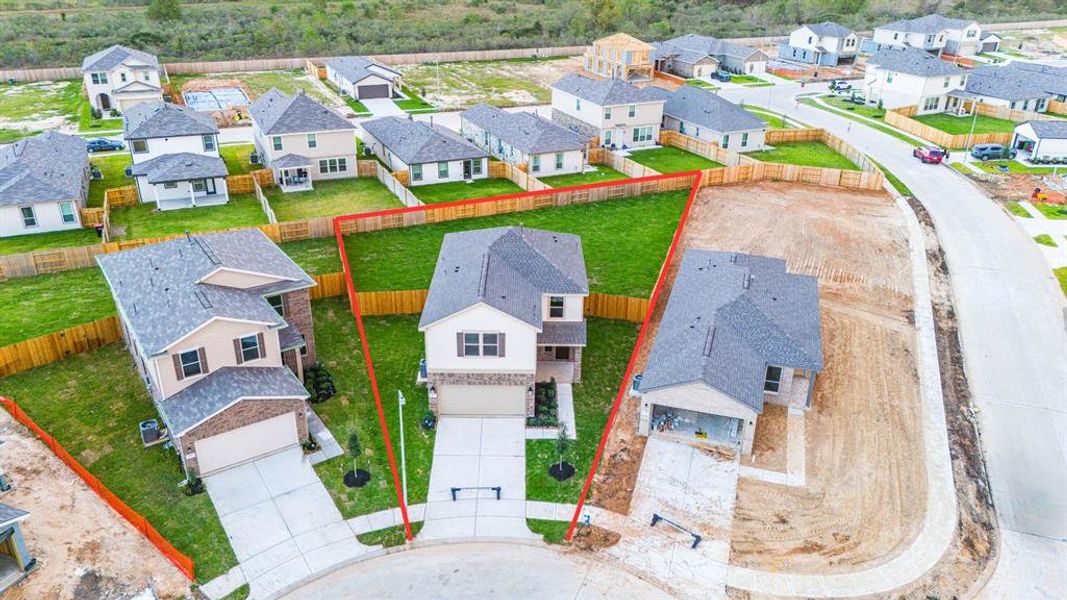 Amazing aerial shot of this gorgeous KB Home home situated on a LARGE CUL-DE-SAC LOT. Lush landscaping, well manicured front lawn and a wonderful back.