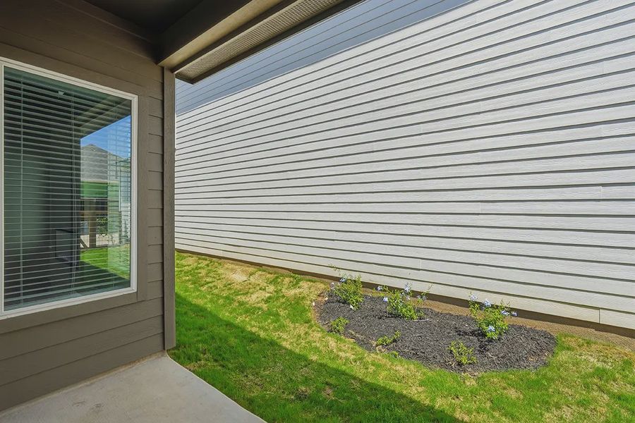 Exterior details and patio area of a home in The Crossvine, Schertz (Image 29).