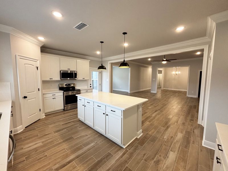 Furnished interior view inside a new home in Bird Song at Hammock Bay, Freeport (Image 7).