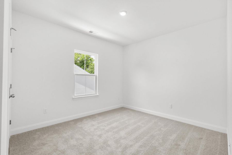 Spacious, unfurnished interior of a new home in Downtown Loris Homes, Loris (Image 42).