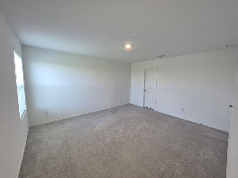 First floor primary bedroom