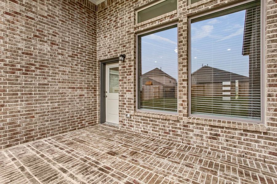 Exterior details and patio area of a home in Wood Leaf Reserve, Tomball (Image 4). Exterior details and patio area of a home in Wood Leaf Reserve, Tomball (Image 4).