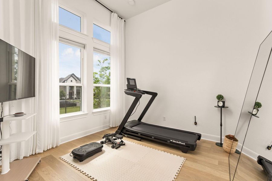 Bright interior space with light wood-finish flooring
