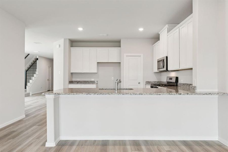 Furnished interior view inside a new home in AnaCapri, Anna (Image 4).