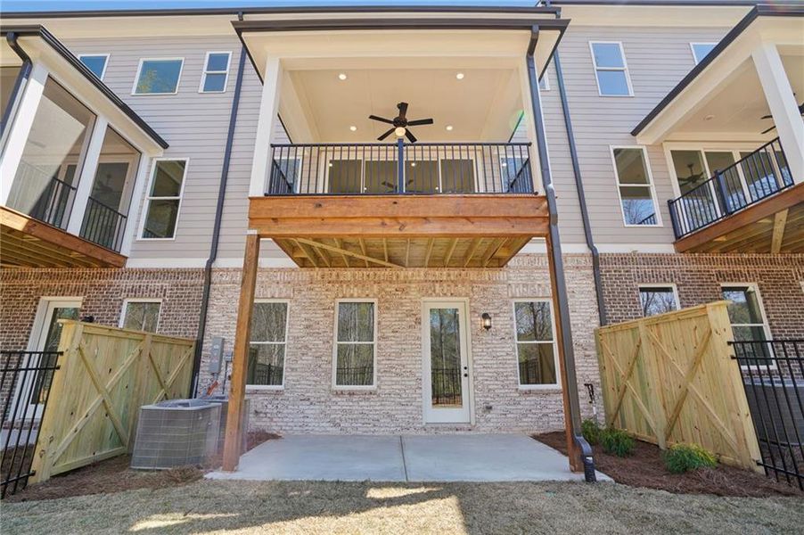 Exterior details and patio area of a home in Waterside Townhomes, Peachtree Corners (Image 22).