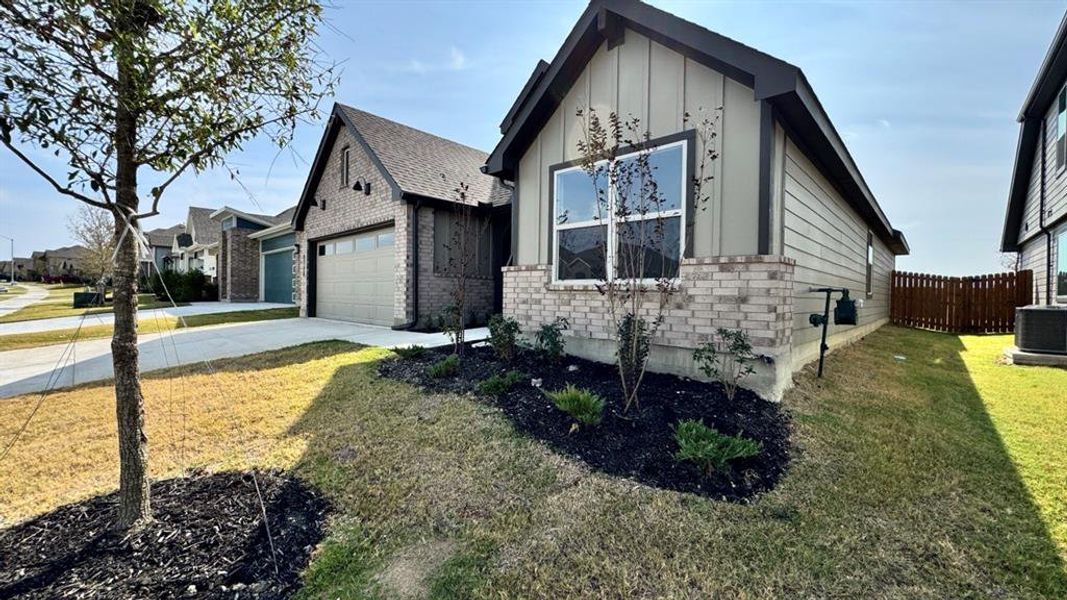 Front exterior of a new home in Rock Creek Ranch, Fort Worth, TX, highlighting curb appeal (Image 17).
