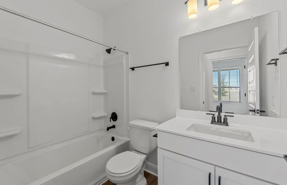 Furnished interior view inside a new home in Santa Rita Ranch, Liberty Hill (Image 9).
