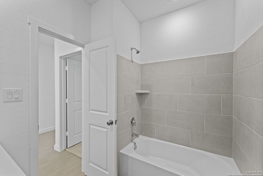 Furnished interior view inside a new home in Hidden Trails: Coastline Collection, Bulverde (Image 8).