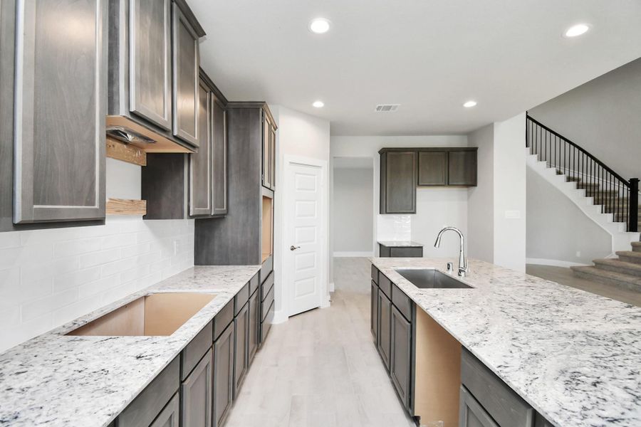 Sample photo of completed home with similar floor plan. Actual colors and selections may vary. Sample photo of completed home with similar floor plan. Actual colors and selections may vary.