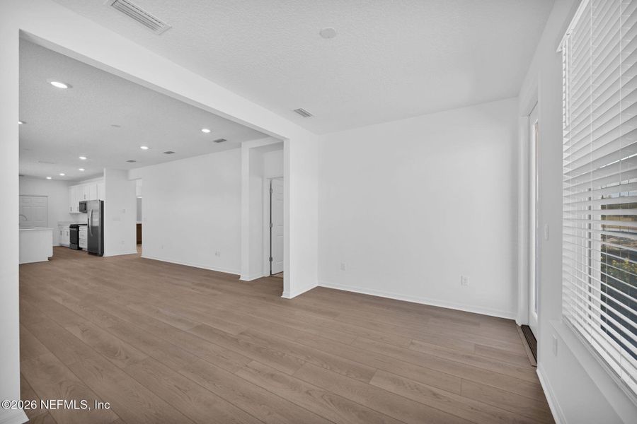 Spacious, unfurnished interior of a new home in Del Webb Wildlight, Yulee (Image 10).
