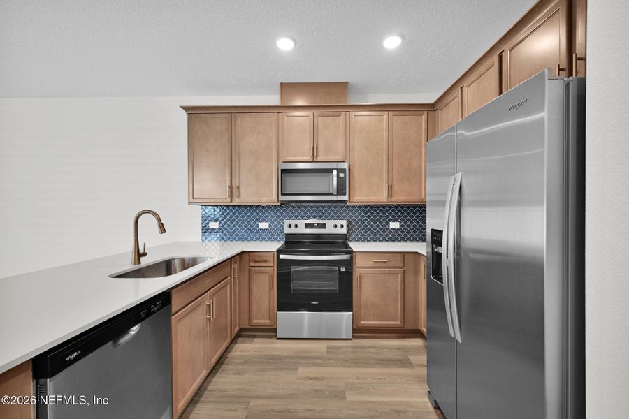 Furnished interior view inside a new home in Baxley Villas, Middleburg (Image 7).