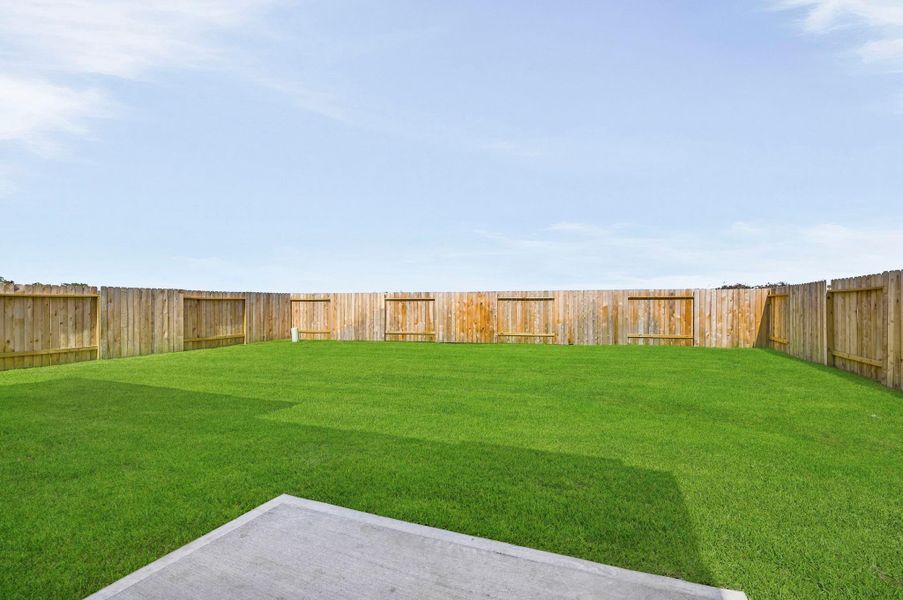 Exterior details and patio area of a home in Barrett Crossing, Crosby (Image 21).