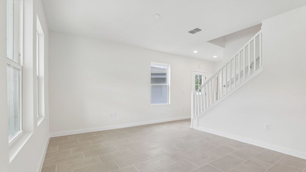 Furnished interior view inside a new home in Cyrene at Harmony, St. Cloud (Image 7).